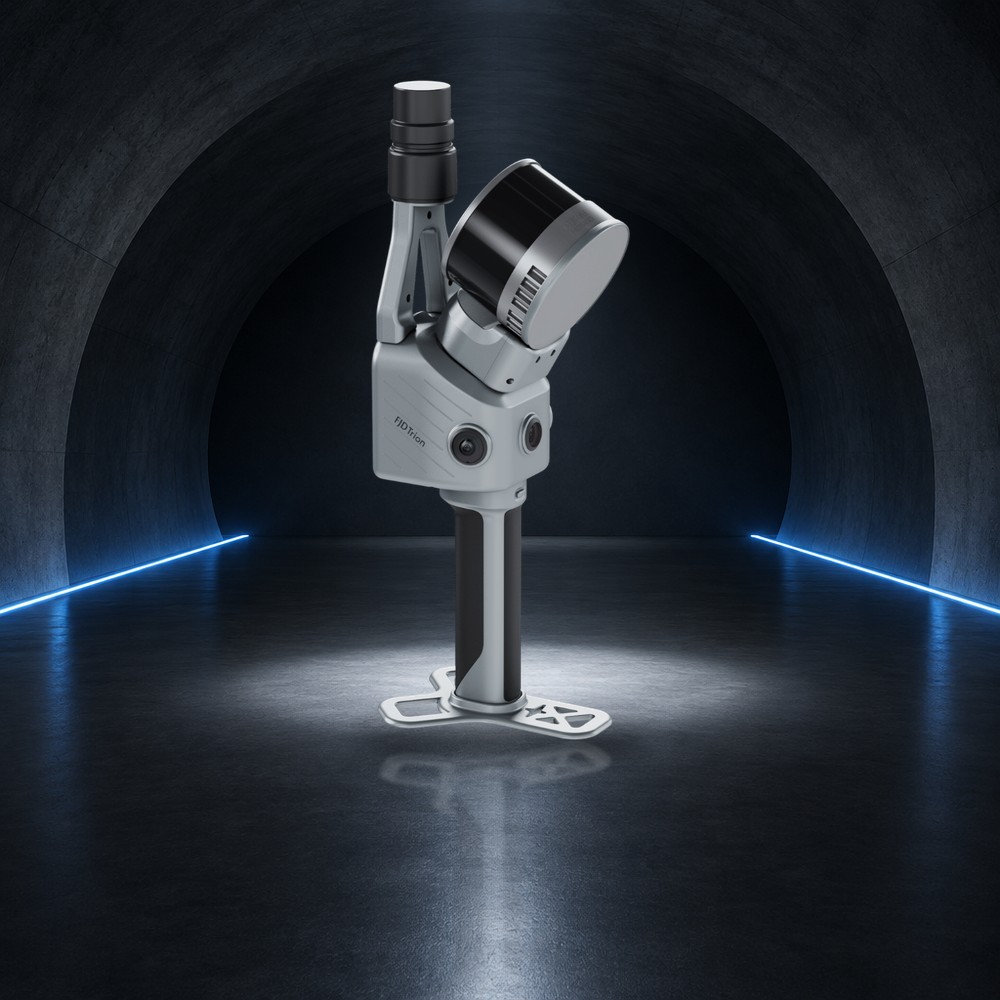 FJD Trion T1 hybrid LiDAR scanner on a spotlit stage