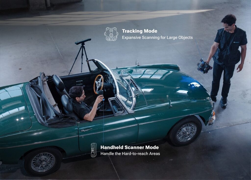 EinScan Trak tracking a car body, with the handheld scanner reaching the engine bay and interior